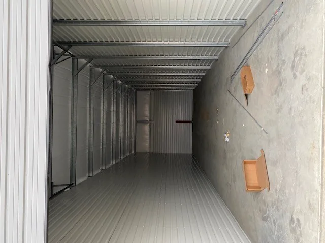 Inside a 50 foot storage unit looking toward the back wall